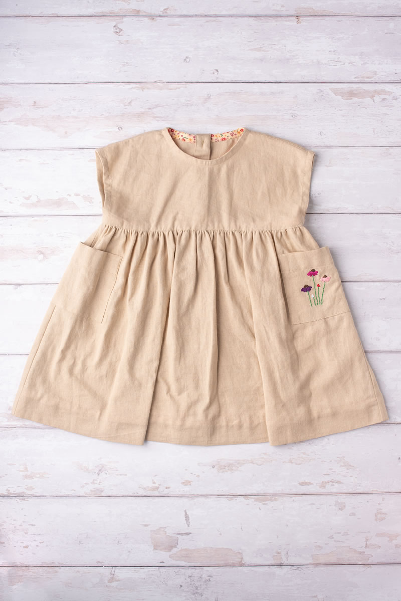 washed linen baby dress by made by the sea cornwall